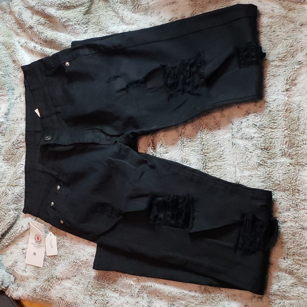 Distressed knee black denim jeans